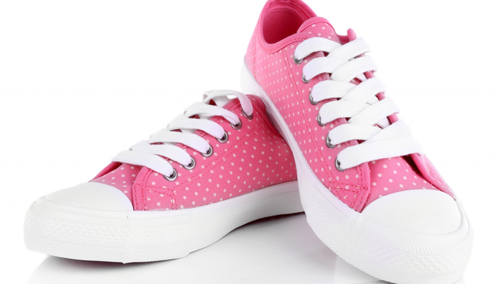 Pink trainers isolated on white